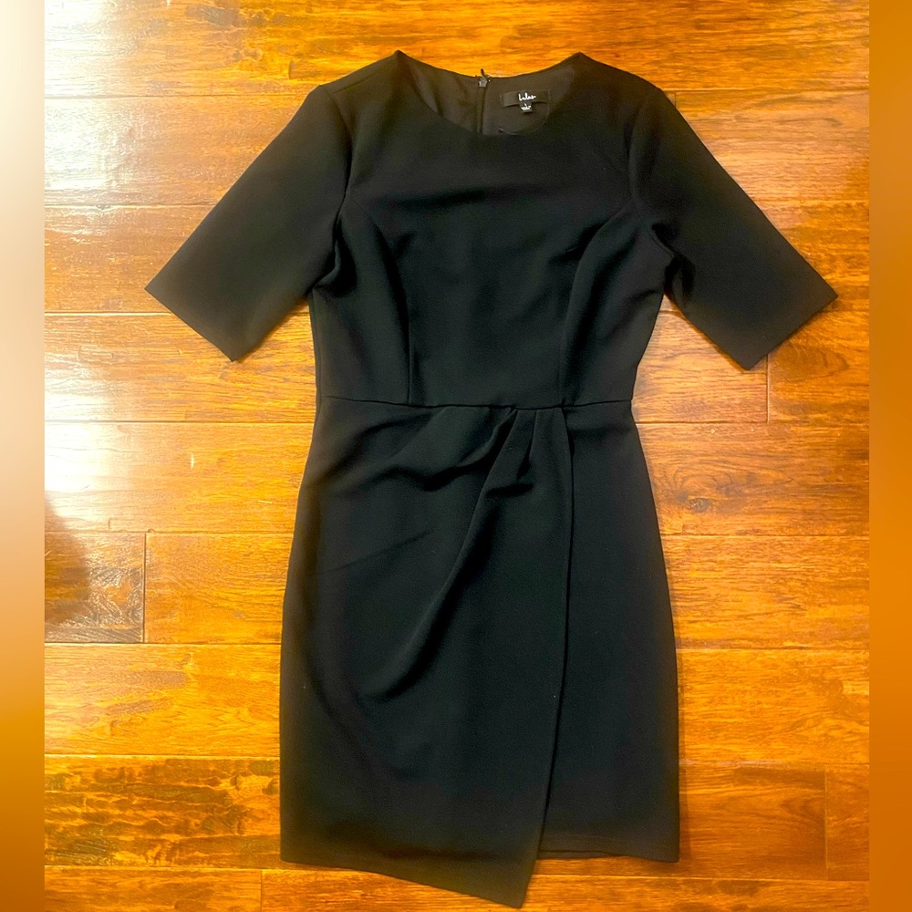 Lulu’s black dress.  Smoke free pet free.  New without tag.